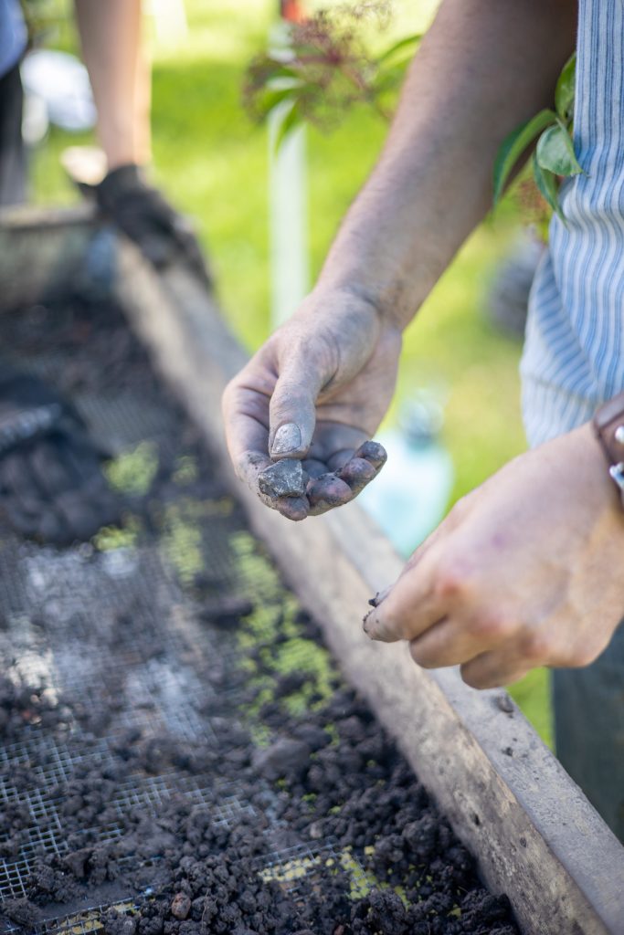 Close-up image of an object found during archaeological digs on Woodland’s grounds during the 2025 Julyteenth program. Community Archeology days will be a part of Woodland’s forthcoming educational programming.